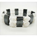 Wholesale magnetic stretch bracelet with white plastic beads 7.25'